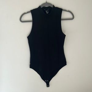 Mock neck sleeveless body suit